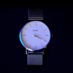 a watch with a blue face