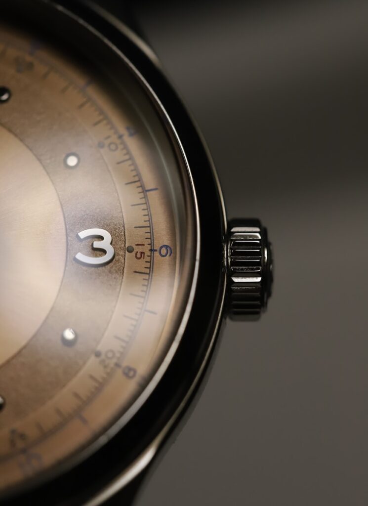 a close up of a watch on a table