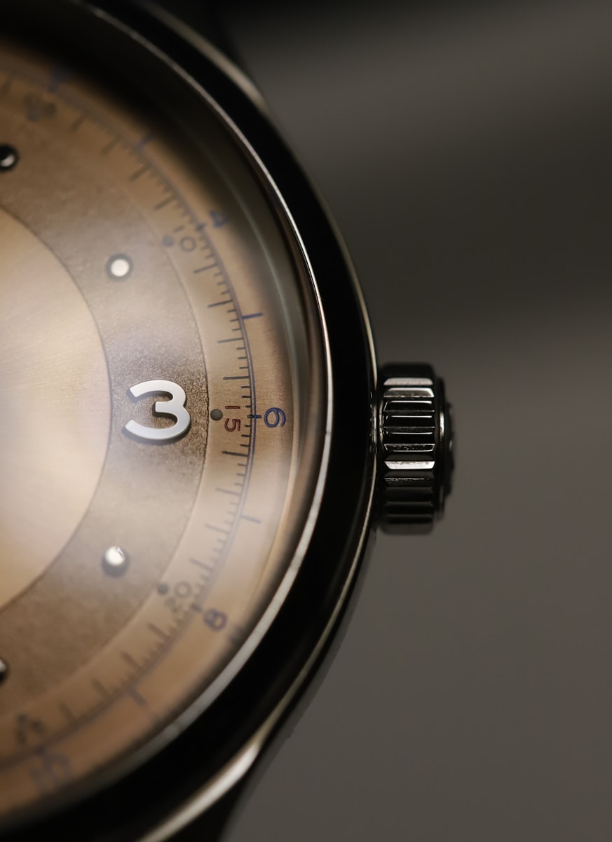 a close up of a watch on a table