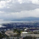 a view of a city and a body of water